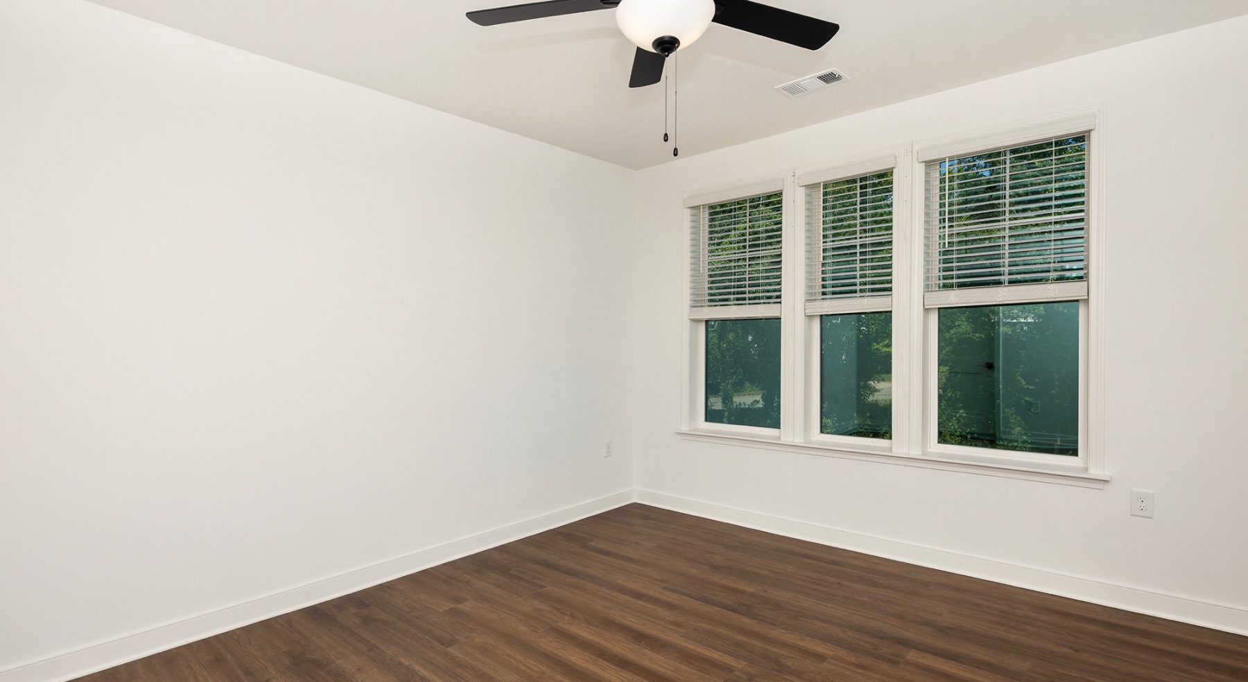 ceiling fan and light fixture in room